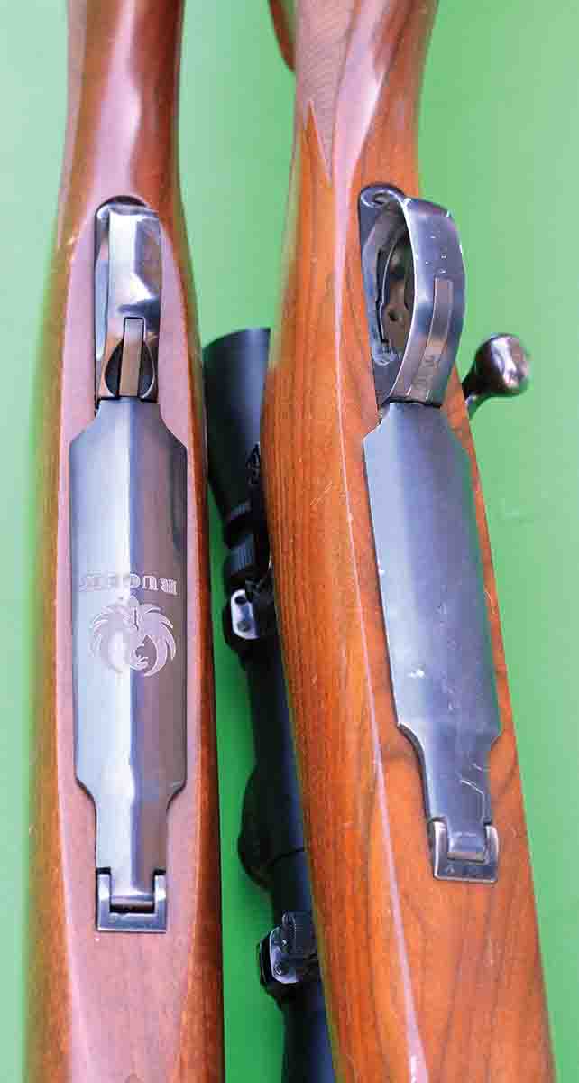 The M77 Hawkeye (left) features an improved floorplate latch, steel floorplate and trigger guard; while the original M77 features aluminum bottom metal.